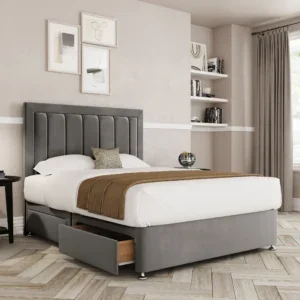 a bed with a storage drawer in a room