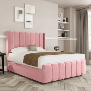 a pink bed in a room