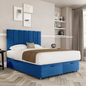 a blue and white bed in a room