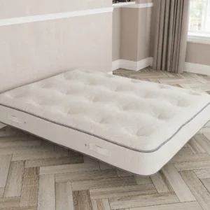 a mattress in a room