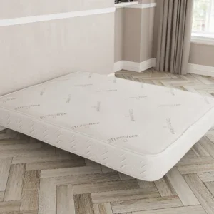 a mattress in a room
