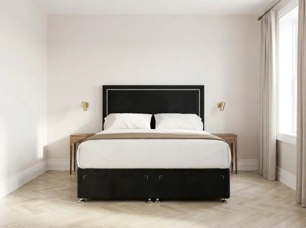 Super king bed centred in a small bedroom with a walkway on both sides