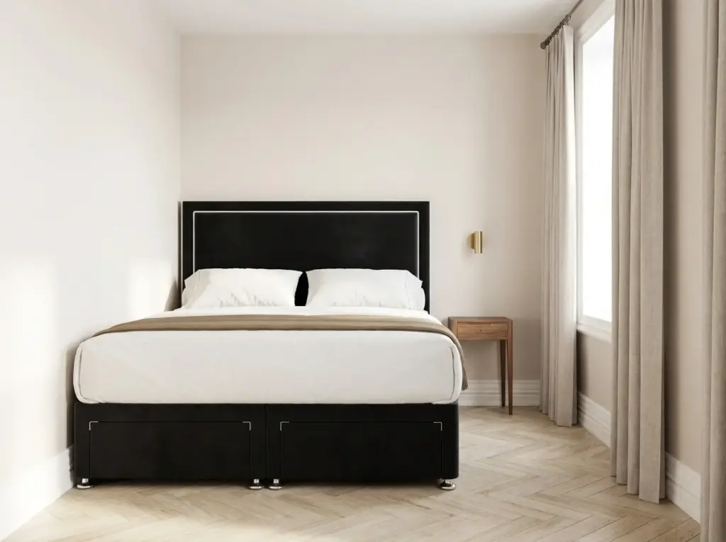 Super king bed positioned in the corner of a small bedroom